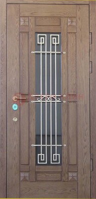 Стандартная железная дверь со стеклом темным и ковкой ДСК-5 в Павловском Посаде