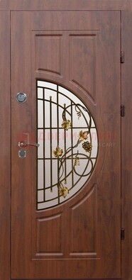 Стальная коричневая дверь с виноритом и ковкой ДВТ-82 в Павловском Посаде